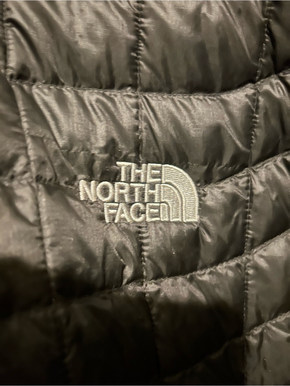 The North Face Black Quilted Jacket with Embroidered Tito's Logo (XL)